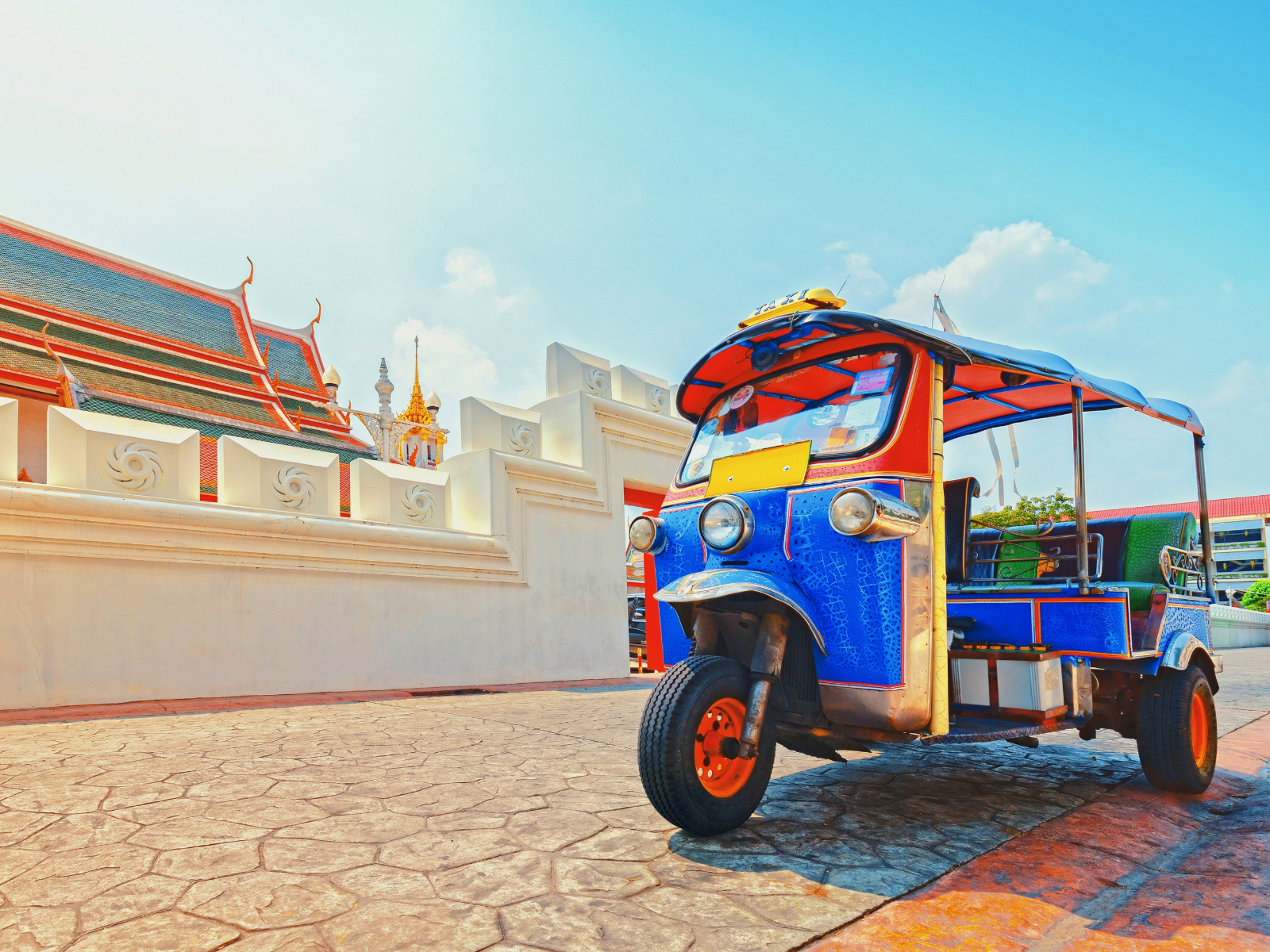 Tuk-tuk and temple, Bangkok